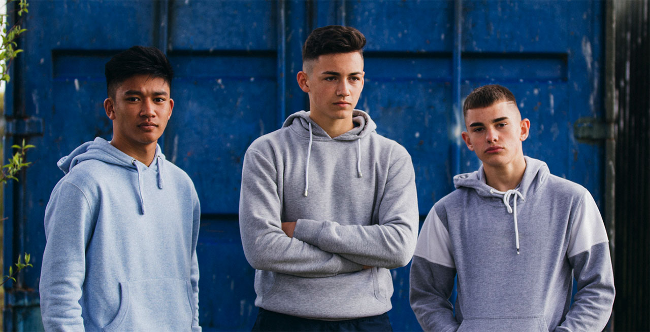 Three boys in hoodies