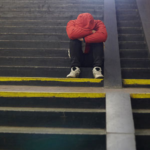 boy sitting on steps